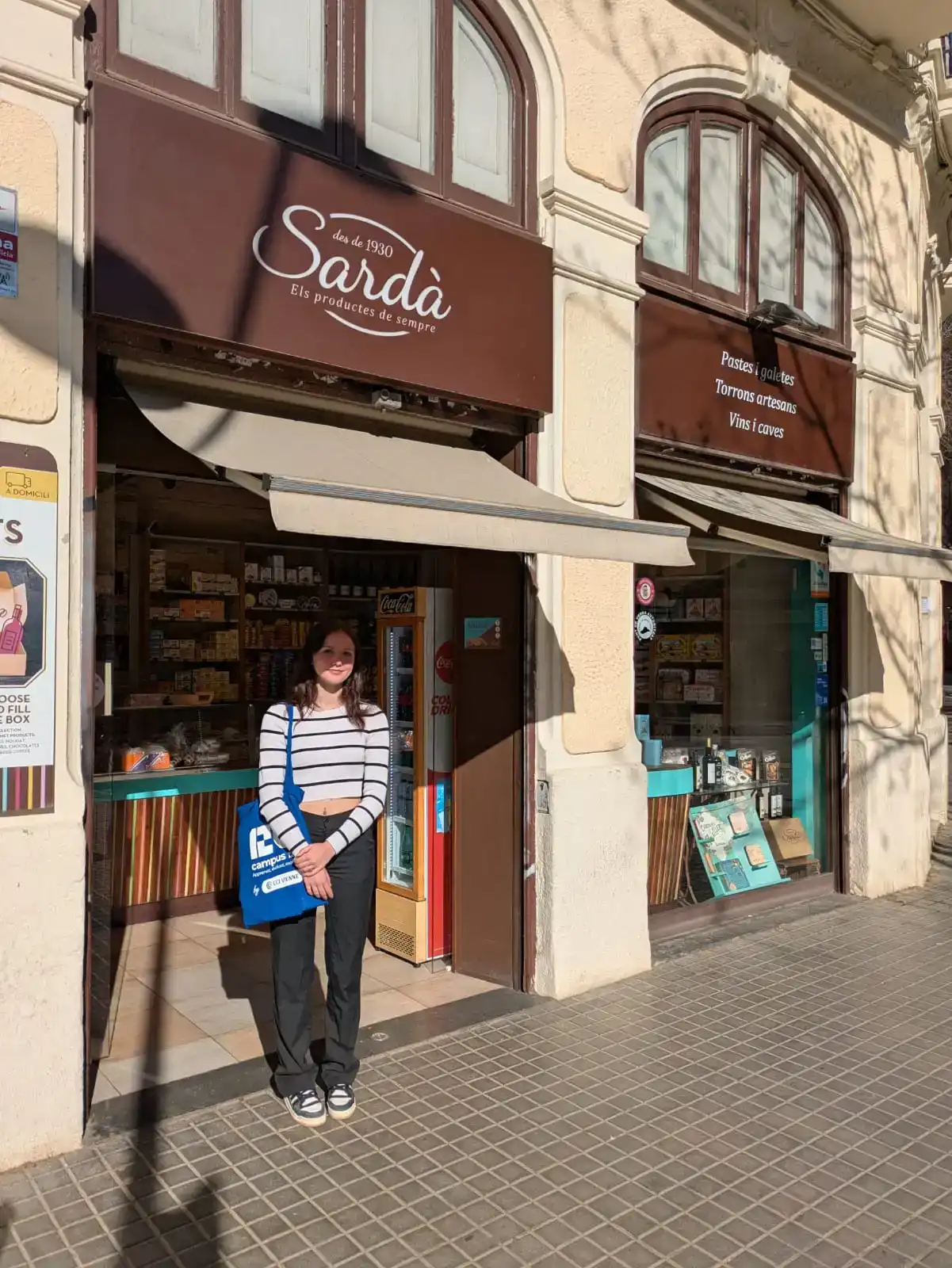 Intern posing in front of the Barcelona boutique where she is doing her internship.